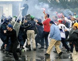 Riot police provide against soccer hooligans